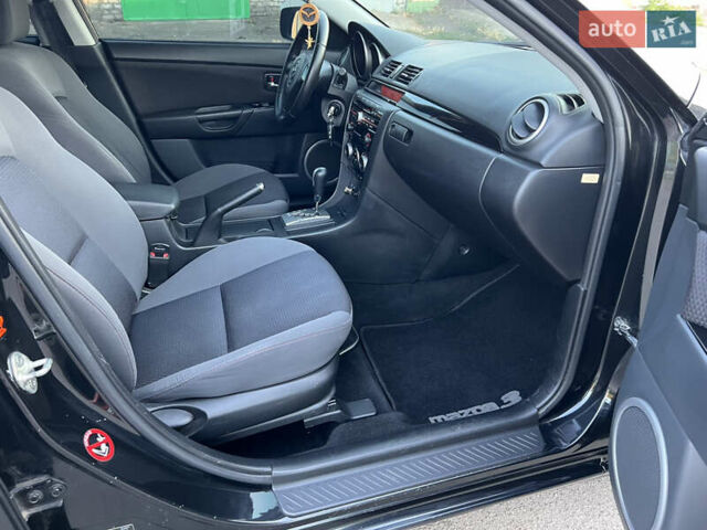 Чорний Мазда 3, об'ємом двигуна 2 л та пробігом 167 тис. км за 7500 $, фото 9 на Automoto.ua