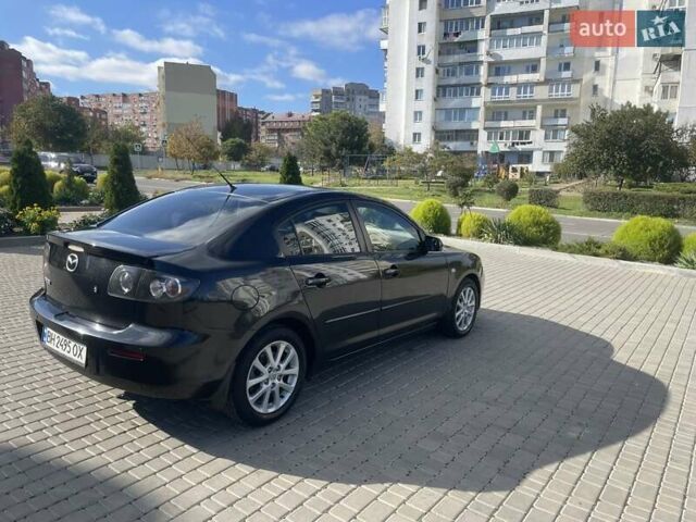 Черный Мазда 3, объемом двигателя 2 л и пробегом 175 тыс. км за 6000 $, фото 6 на Automoto.ua