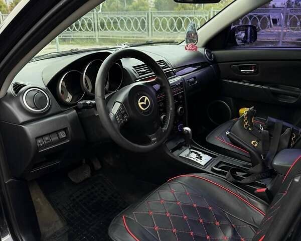Черный Мазда 3, объемом двигателя 1.6 л и пробегом 253 тыс. км за 5400 $, фото 6 на Automoto.ua