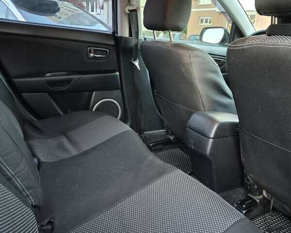 Чорний Мазда 3, об'ємом двигуна 1.6 л та пробігом 253 тис. км за 5200 $, фото 24 на Automoto.ua