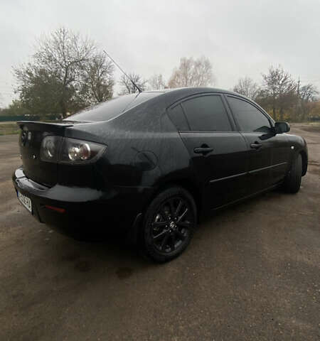 Черный Мазда 3, объемом двигателя 2 л и пробегом 182 тыс. км за 5500 $, фото 4 на Automoto.ua
