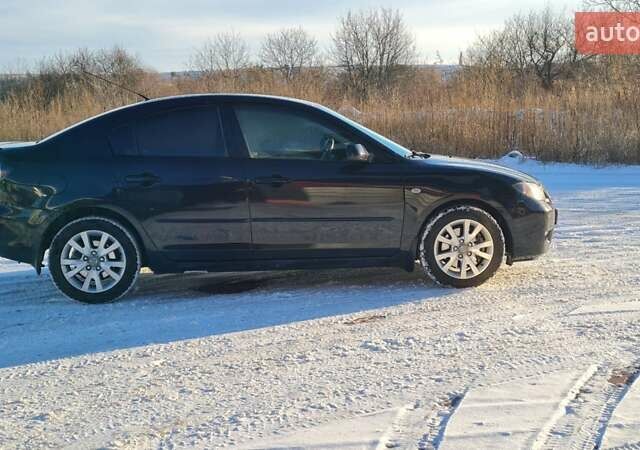 Черный Мазда 3, объемом двигателя 2 л и пробегом 255 тыс. км за 5000 $, фото 2 на Automoto.ua