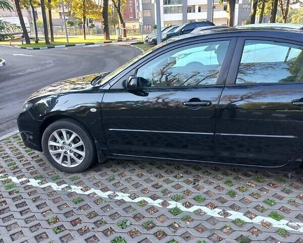 Черный Мазда 3, объемом двигателя 1.6 л и пробегом 121 тыс. км за 6000 $, фото 3 на Automoto.ua