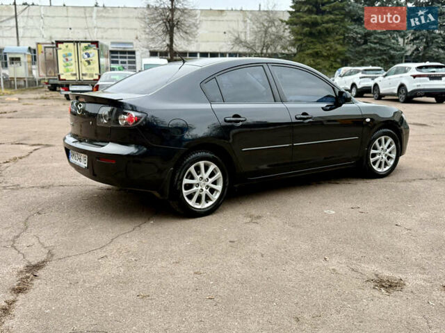 Чорний Мазда 3, об'ємом двигуна 1.6 л та пробігом 183 тис. км за 6150 $, фото 17 на Automoto.ua