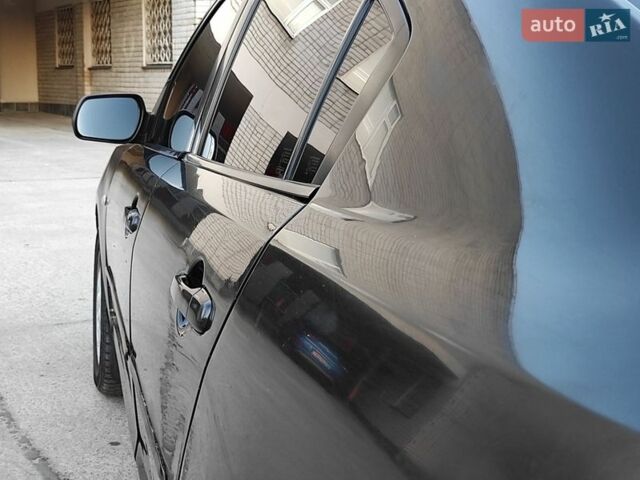 Чорний Мазда 3, об'ємом двигуна 2 л та пробігом 250 тис. км за 3550 $, фото 11 на Automoto.ua