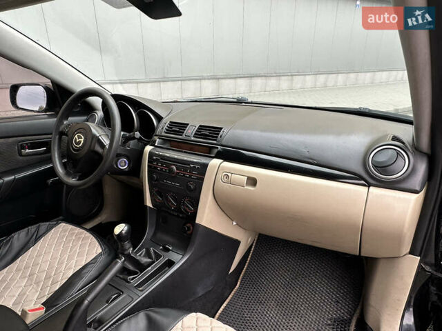 Черный Мазда 3, объемом двигателя 2 л и пробегом 200 тыс. км за 2700 $, фото 17 на Automoto.ua