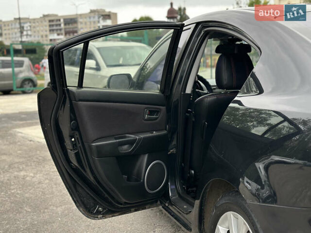 Чорний Мазда 3, об'ємом двигуна 1.6 л та пробігом 223 тис. км за 5450 $, фото 38 на Automoto.ua