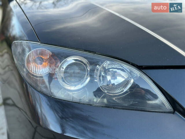 Чорний Мазда 3, об'ємом двигуна 1.6 л та пробігом 198 тис. км за 5499 $, фото 28 на Automoto.ua