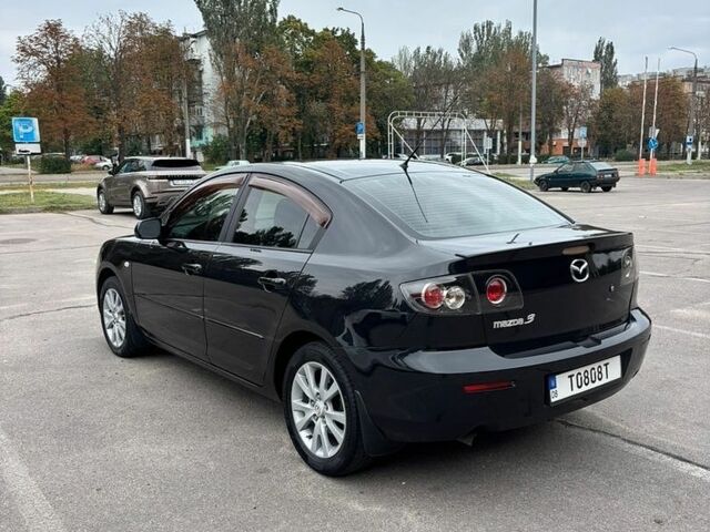 Черный Мазда 3, объемом двигателя 1.6 л и пробегом 192 тыс. км за 5800 $, фото 4 на Automoto.ua