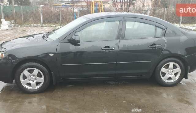 Черный Мазда 3, объемом двигателя 1.6 л и пробегом 205 тыс. км за 5600 $, фото 5 на Automoto.ua