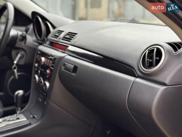 Черный Мазда 3, объемом двигателя 1.6 л и пробегом 130 тыс. км за 7700 $, фото 36 на Automoto.ua