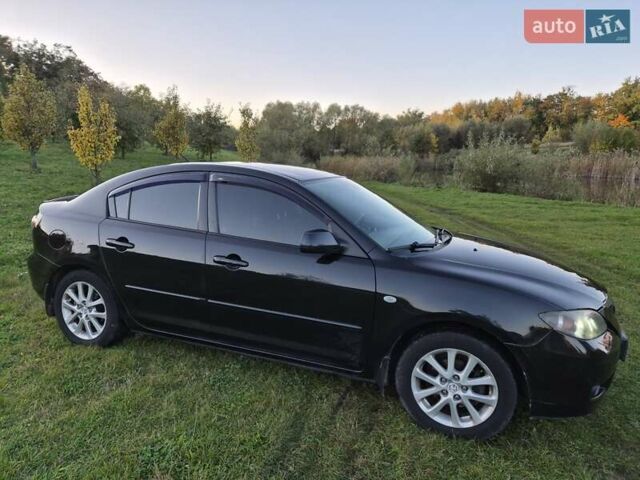 Чорний Мазда 3, об'ємом двигуна 1.6 л та пробігом 253 тис. км за 5200 $, фото 7 на Automoto.ua