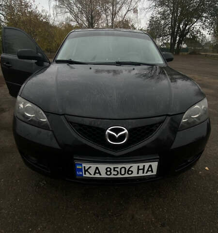 Черный Мазда 3, объемом двигателя 2 л и пробегом 182 тыс. км за 5500 $, фото 5 на Automoto.ua