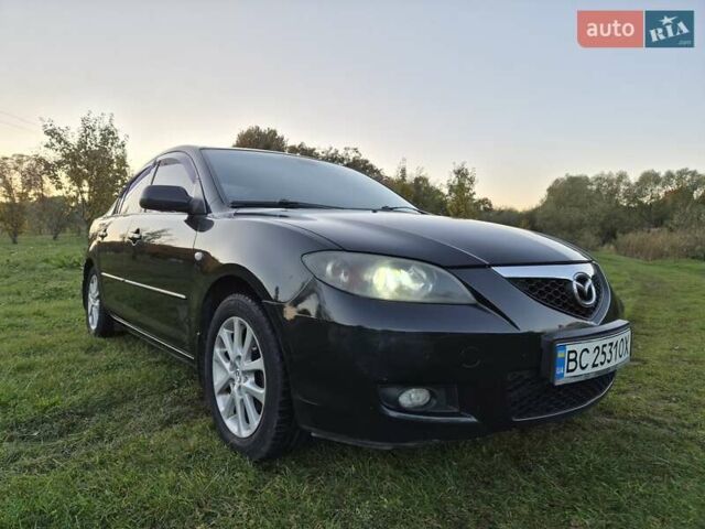 Чорний Мазда 3, об'ємом двигуна 1.6 л та пробігом 253 тис. км за 5200 $, фото 4 на Automoto.ua
