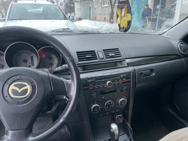 Чорний Мазда 3, об'ємом двигуна 1.6 л та пробігом 235 тис. км за 4000 $, фото 16 на Automoto.ua