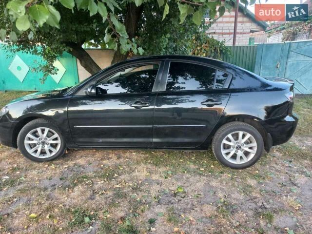 Черный Мазда 3, объемом двигателя 2 л и пробегом 247 тыс. км за 5800 $, фото 4 на Automoto.ua