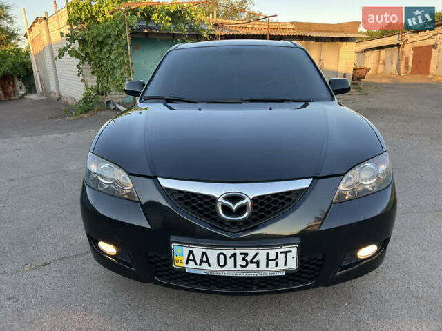 Чорний Мазда 3, об'ємом двигуна 2 л та пробігом 167 тис. км за 7500 $, фото 7 на Automoto.ua