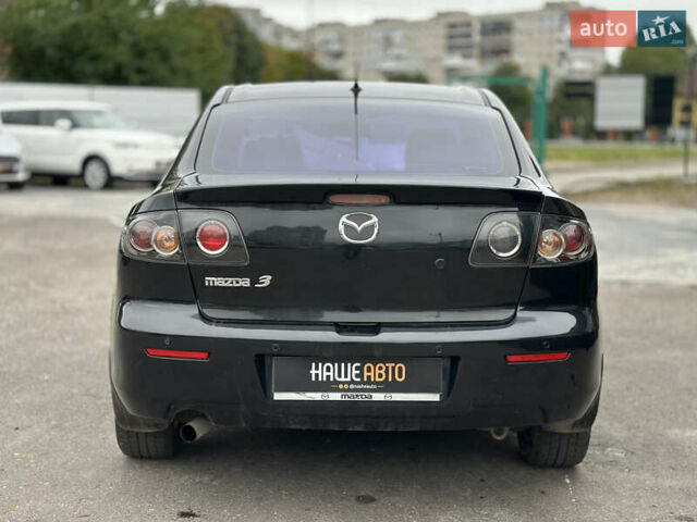 Чорний Мазда 3, об'ємом двигуна 1.6 л та пробігом 223 тис. км за 5450 $, фото 14 на Automoto.ua