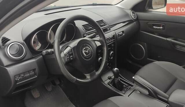 Черный Мазда 3, объемом двигателя 1.6 л и пробегом 146 тыс. км за 4800 $, фото 10 на Automoto.ua