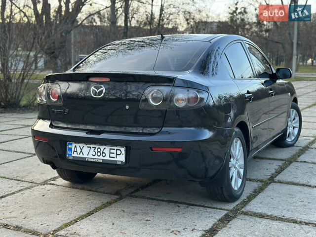 Чорний Мазда 3, об'ємом двигуна 1.6 л та пробігом 198 тис. км за 5499 $, фото 18 на Automoto.ua