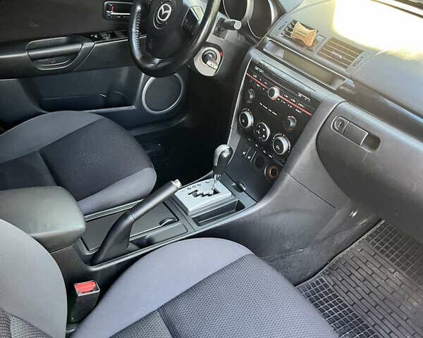 Чорний Мазда 3, об'ємом двигуна 2 л та пробігом 220 тис. км за 5500 $, фото 23 на Automoto.ua