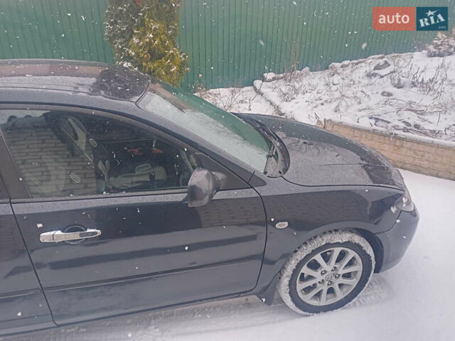 Черный Мазда 3, объемом двигателя 1.6 л и пробегом 200 тыс. км за 5800 $, фото 7 на Automoto.ua