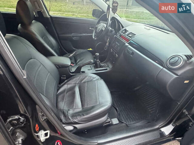 Чорний Мазда 3, об'ємом двигуна 1.6 л та пробігом 154 тис. км за 4550 $, фото 8 на Automoto.ua