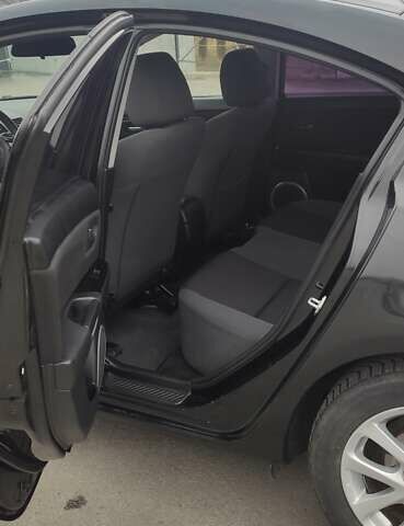 Черный Мазда 3, объемом двигателя 1.6 л и пробегом 146 тыс. км за 4800 $, фото 13 на Automoto.ua