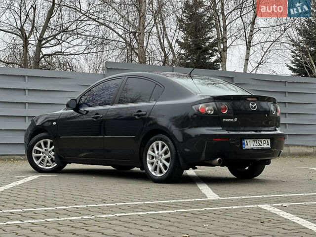 Черный Мазда 3, объемом двигателя 1.6 л и пробегом 256 тыс. км за 5450 $, фото 10 на Automoto.ua