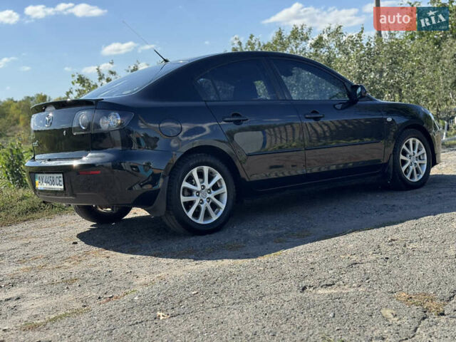 Чорний Мазда 3, об'ємом двигуна 1.6 л та пробігом 160 тис. км за 5999 $, фото 6 на Automoto.ua