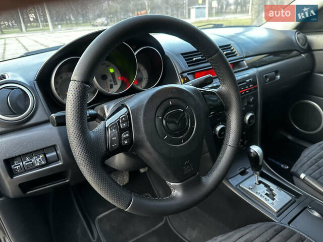 Чорний Мазда 3, об'ємом двигуна 1.6 л та пробігом 198 тис. км за 5499 $, фото 29 на Automoto.ua