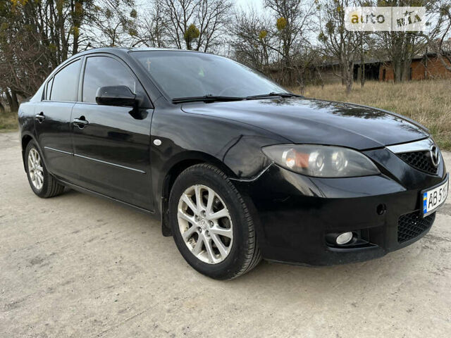 Чорний Мазда 3, об'ємом двигуна 2 л та пробігом 295 тис. км за 5699 $, фото 15 на Automoto.ua