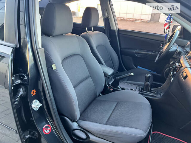 Чорний Мазда 3, об'ємом двигуна 1.6 л та пробігом 183 тис. км за 5600 $, фото 22 на Automoto.ua