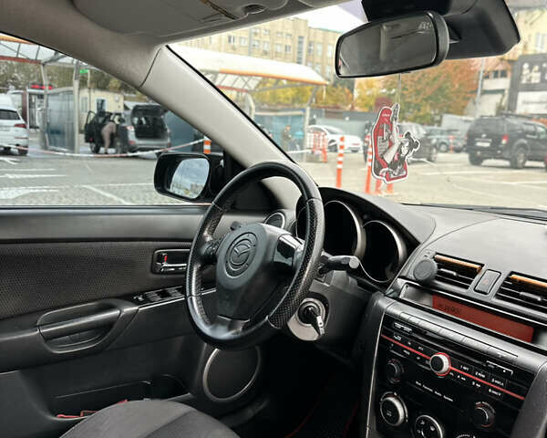 Черный Мазда 3, объемом двигателя 1.6 л и пробегом 262 тыс. км за 5500 $, фото 9 на Automoto.ua