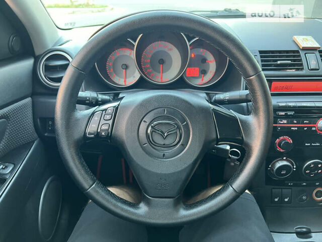 Чорний Мазда 3, об'ємом двигуна 1.6 л та пробігом 183 тис. км за 5600 $, фото 26 на Automoto.ua