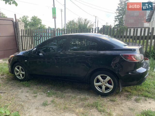 Черный Мазда 3, объемом двигателя 2 л и пробегом 165 тыс. км за 6500 $, фото 3 на Automoto.ua