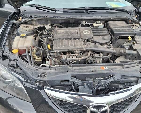 Чорний Мазда 3, об'ємом двигуна 1.6 л та пробігом 208 тис. км за 6600 $, фото 8 на Automoto.ua
