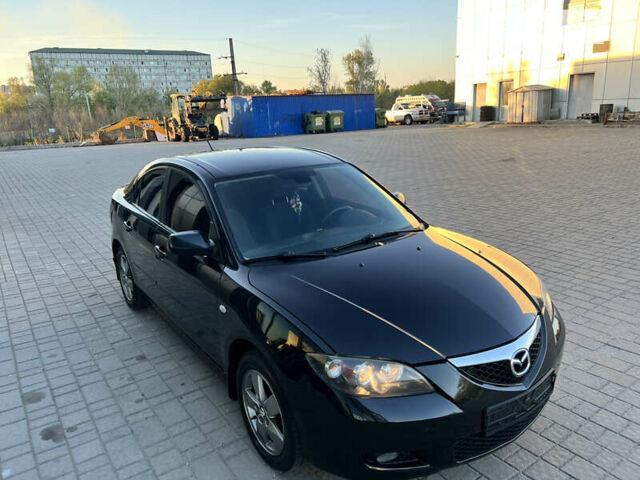 Чорний Мазда 3, об'ємом двигуна 1.6 л та пробігом 183 тис. км за 5600 $, фото 13 на Automoto.ua