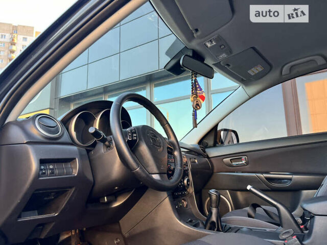 Чорний Мазда 3, об'ємом двигуна 1.6 л та пробігом 183 тис. км за 5600 $, фото 20 на Automoto.ua