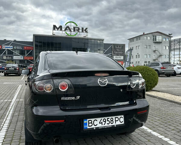 Черный Мазда 3, объемом двигателя 1.6 л и пробегом 262 тыс. км за 5500 $, фото 5 на Automoto.ua