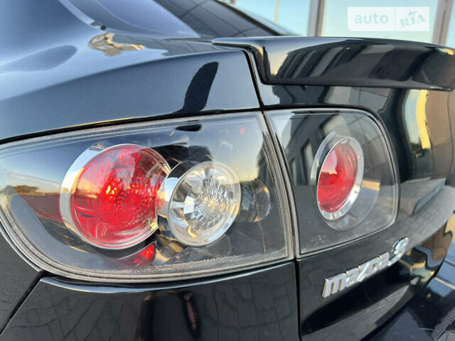 Чорний Мазда 3, об'ємом двигуна 1.6 л та пробігом 183 тис. км за 5600 $, фото 17 на Automoto.ua