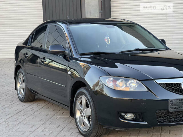 Чорний Мазда 3, об'ємом двигуна 1.6 л та пробігом 183 тис. км за 5600 $, фото 9 на Automoto.ua