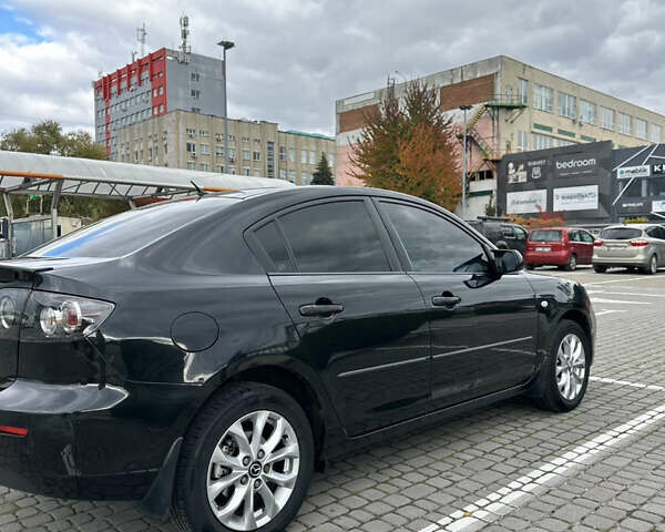 Черный Мазда 3, объемом двигателя 1.6 л и пробегом 262 тыс. км за 5500 $, фото 6 на Automoto.ua