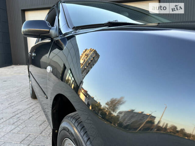 Чорний Мазда 3, об'ємом двигуна 1.6 л та пробігом 183 тис. км за 5600 $, фото 11 на Automoto.ua