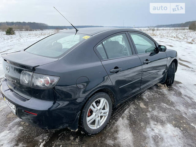 Чорний Мазда 3, об'ємом двигуна 1.6 л та пробігом 298 тис. км за 5350 $, фото 13 на Automoto.ua