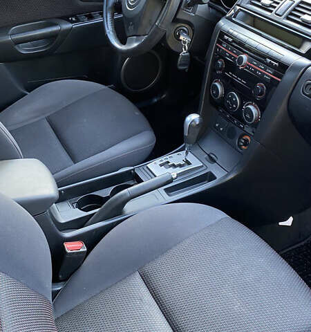 Черный Мазда 3, объемом двигателя 1.6 л и пробегом 187 тыс. км за 6595 $, фото 4 на Automoto.ua