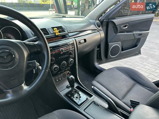 Черный Мазда 3, объемом двигателя 1.6 л и пробегом 202 тыс. км за 7199 $, фото 14 на Automoto.ua