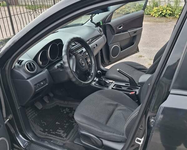 Чорний Мазда 3, об'ємом двигуна 1.6 л та пробігом 208 тис. км за 6600 $, фото 6 на Automoto.ua