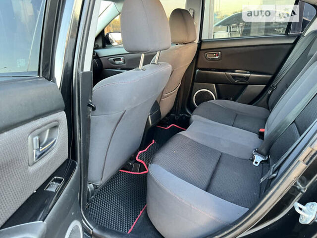 Чорний Мазда 3, об'ємом двигуна 1.6 л та пробігом 183 тис. км за 5600 $, фото 21 на Automoto.ua