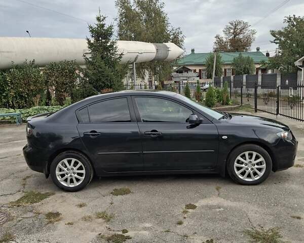 Чорний Мазда 3, об'ємом двигуна 1.6 л та пробігом 208 тис. км за 6600 $, фото 9 на Automoto.ua